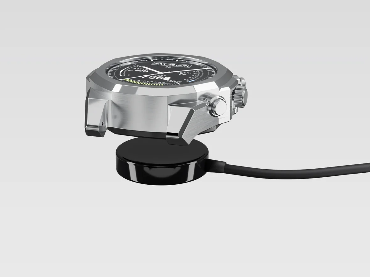 Render of the watch above its charging puck, with the cable running out to the side.